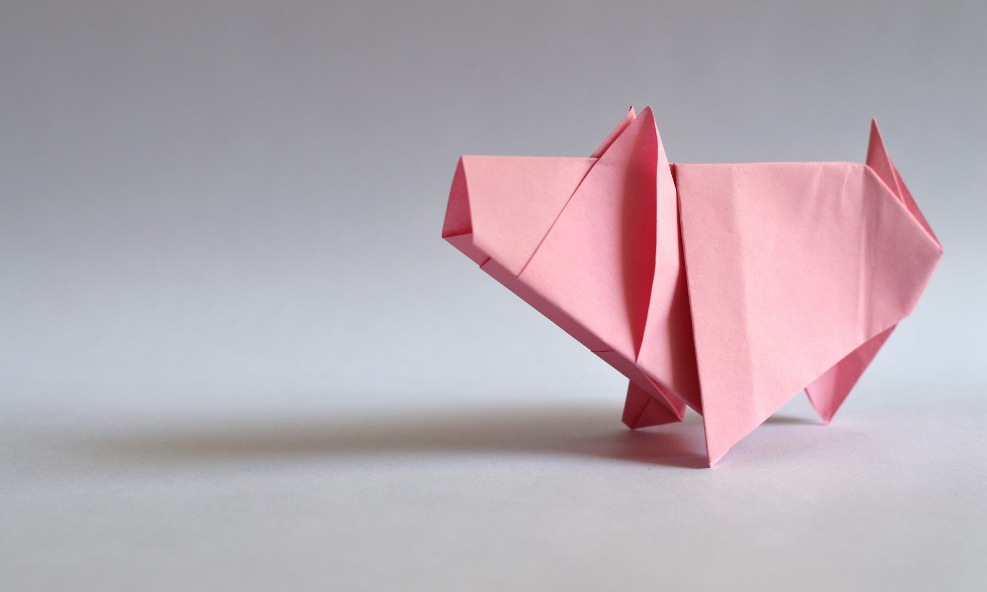 Ein rosa Origami-Schwein